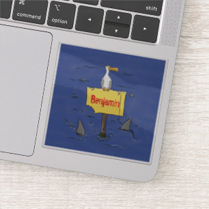 Grappig zee vogel omringd door cartoon van haaien sticker
