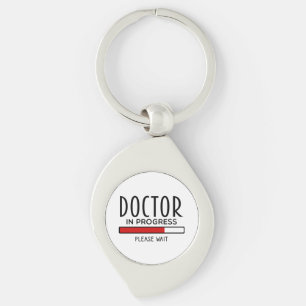 Grappige dokter in opleiding geneeskundestudent   sleutelhanger