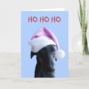 Grappige hond met roze kerstkaart van de kerstman feestdagen kaart