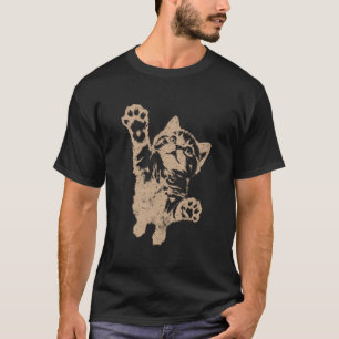 Grappige kat die op bruine versleten vintage grun t-shirt