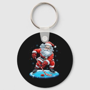 Grappige kerst Kerstman speelt ijshockey Kerst spo Sleutelhanger