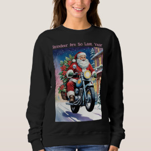 Grappige Kerstman op motor doet een wheelie Trui
