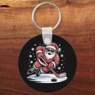 Grappige Kerstman speelt ijshockey Kerstmis Sleutelhanger