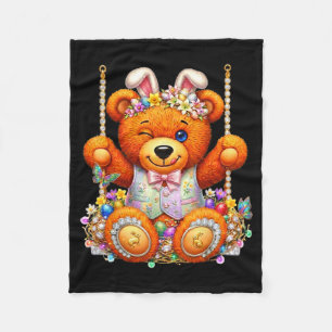 Grappige knuffelende teddybeer knipogende ogen paa fleece deken