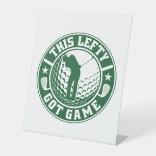 Grappige linkshandige golfspeler reclamebord met voetstuk