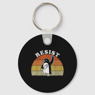 Grappige pinguïn verzet zich tegen pinguïns protes sleutelhanger