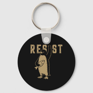 Grappige pinguïn verzet zich tegen pinguïns protes sleutelhanger