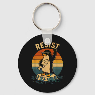 Grappige pinguïn verzet zich tegen pinguïns protes sleutelhanger
