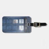 Grappige reizigers in politiebox met monogram bagagelabel (Voorkant horizontaal)