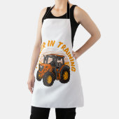 Grappige toekomstige boer in opleiding tractorland schort (Insitu)