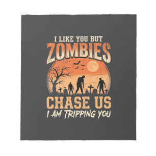 Grappige zombies halloween achtervolgen ons ontwer notitieblok