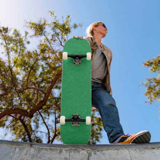 Green textured surface with  swirling pattern skateboard (Buiten 1)