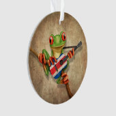 Grenouille d'arbre jouant la guitare de drapeau du (devant)