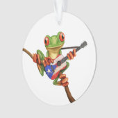 Grenouille d'arbre jouant le blanc de guitare de (devant)