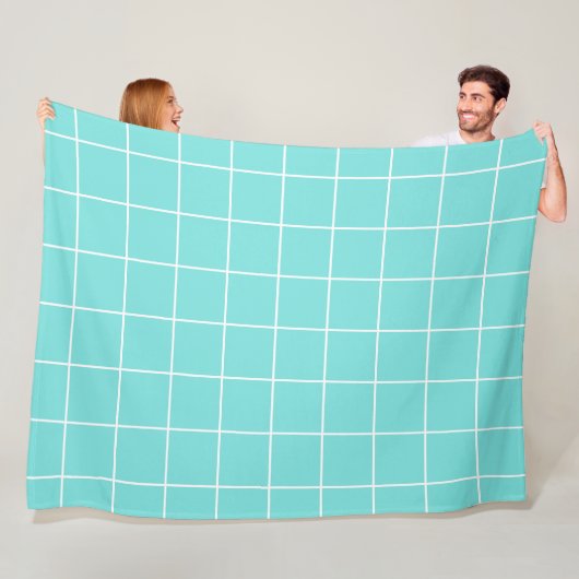 Grid Turquoise en Wit Fleece Deken (In situ)