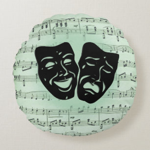 Griekse maskers voor groene muziek en bioscoop rond kussen