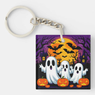 Griezelige Halloween-scène met geesten Sleutelhanger