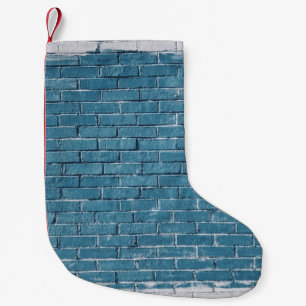 Grijze betonstenen verven in blauw kleine kerstsok