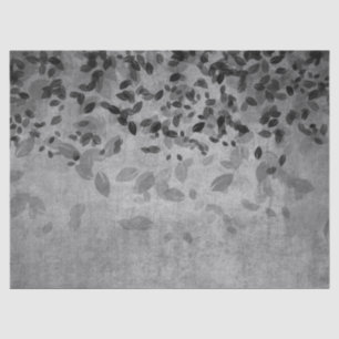 Grijze en zwarte bladeren op grijze ontkoppeling tissuepapier