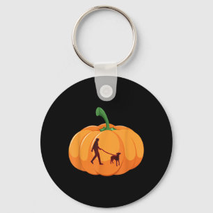 Grijze hond die wandelt op Halloween hondenpompoen Sleutelhanger