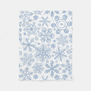 Grijze sneeuwvlokken op gebroken wit fleece deken