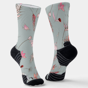 Grijze sokken met zwarte tenen, versierd met roze