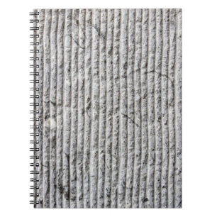 Grijze steenwandtextuur. Textuur van steenwand met Notitieboek