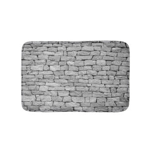 Grijze stenen muur, abstracte achtergrond. badmat