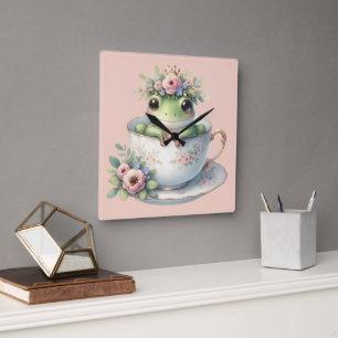 Grillige kikker in bloemige theekop vierkante klok