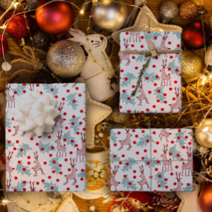 Grillige rendieren en besjes kerstpatroon inpakpapier vel