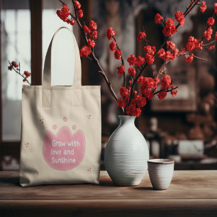 Groeien met liefde en zon tote bag