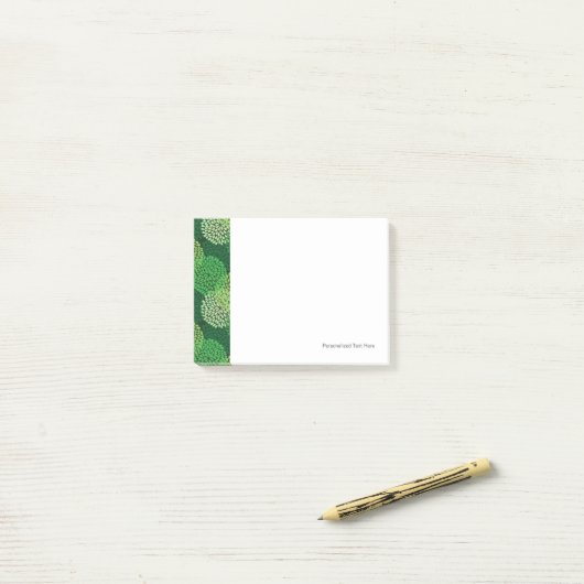 Groen bloempatroon post-it® notes (Op bureau)