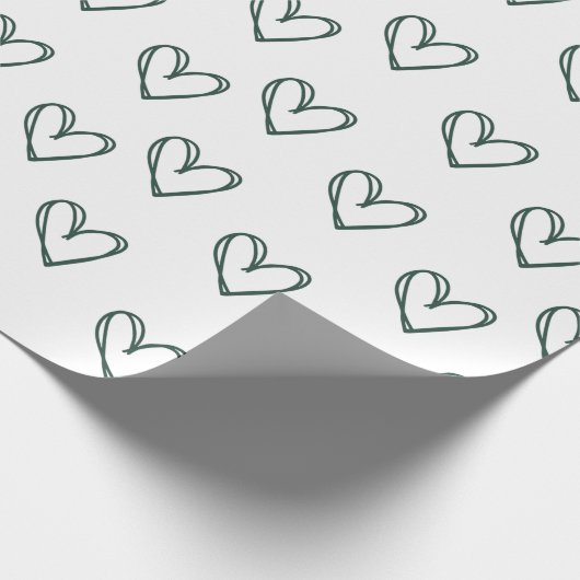 groen hart op wit omslagblad cadeaupapier (Hoek)