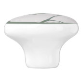 Groen lef op de achtergrond van Cream Keramische Knop (Zijkant)