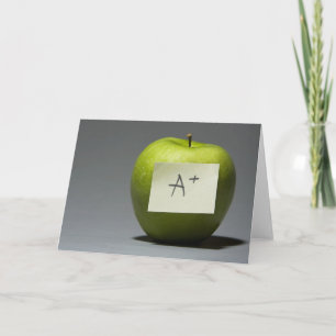 Groene appel met kleefnoot met letter A en Kaart