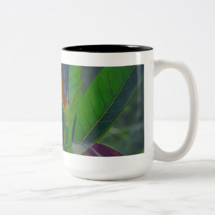 Groene bladeren close-up tweekleurige koffiemok