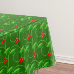 Groene bladeren met kleine rode wilde bessen op gr tafelkleed
