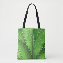 Groene bladeren op een canvas tas