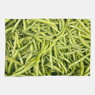 Groene bonen op een keukenhanddoek
