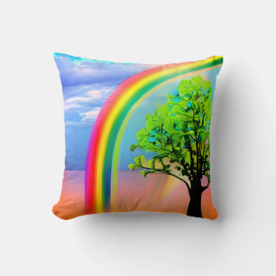 Groene boom onder een regenboog kussen