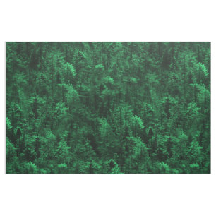 Groene bosbomen die het patroon herhalen stof