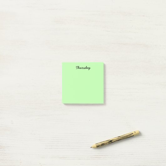 Groene donderdag post-it® notes (Op bureau)
