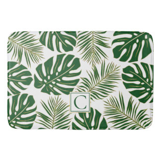 Groene en goudtropische bladeren en monogram badmat