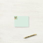 Groene en paarse vlinder post-it® notes (Op bureau)