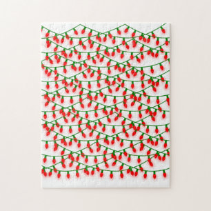 Groene en rode kerstlampjes die rustreren legpuzzel