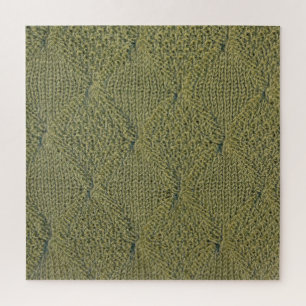 Groene gebreide stof: close-up textuur legpuzzel