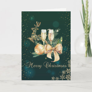 Groene, gouden kerstballen, wijnglas, sneeuwvlokke feestdagen kaart