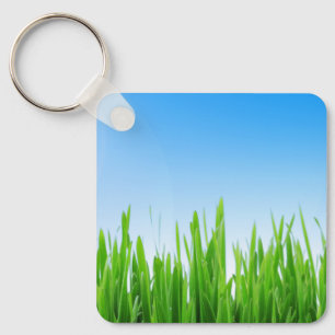 Groene gras tuin met blauwe lucht ontwerp sleutelhanger