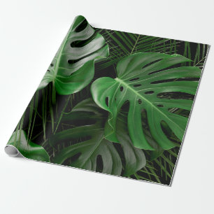 Groene monstera-bladeren en palmbladeren cadeaupapier