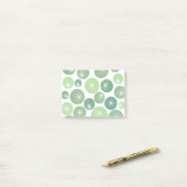 Groene Pinwheels 1950 Post-it® Notes (Op bureau)